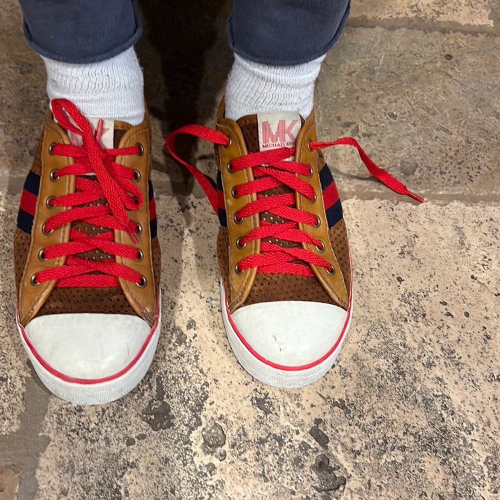 Michael Kors leather tan sneakers with red/blue accents shoelaces are red size 8
